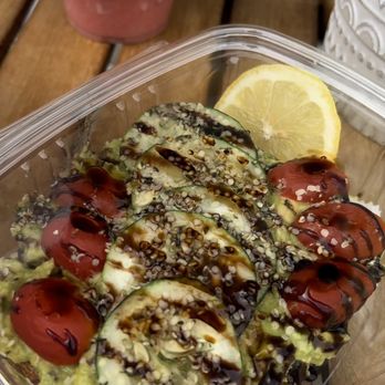 Blendz Cafe - Cucumbers and tomato, avocado toast, with a drizzle of balsamic vinaigrette and hemp seeds. So good!!! - Juice Bars & Smoothies Near Me - Highland Park, New Jersey
