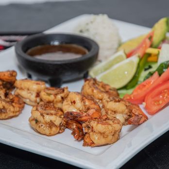 Lucha Restaurant - a plate of shrimp and vegetables - Mexican Near Me - St. Louis, Missouri Lucha Restaurant - a plate of shrimp and vegetables - Mexican Near Me - St. Louis, Missouri
