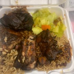 Palm Tree Caribbean Cafe - Supposed to be jerk chicken but they used grace's jerk bbq sauce not jerk. Not a fan.