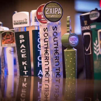 Drifters - a row of beer taps on a bar - New American Near Me - Rochester, New York