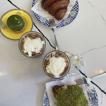 Vavin Dessert Bar - Plain croissant, pistachio croissant with an almond filling, and matcha citron & Hawaiian latte. - Bakeries Near Me - Honolulu, Hawaii Vavin Dessert Bar - Plain croissant, pistachio croissant with an almond filling, and matcha citron & Hawaiian latte. - Bakeries Near Me - Honolulu, Hawaii