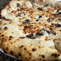 a mushroom pizza a mushroom pizza