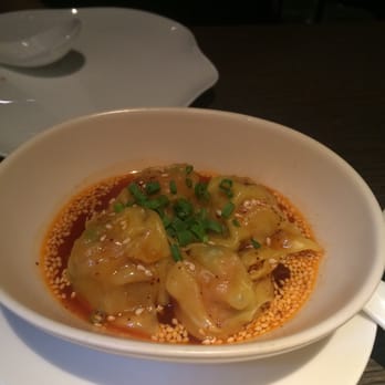 Yauatcha - Spicy pork Szechuan wonton with peanut sauce - Dim Sum Near Me - London, XGL Yauatcha - Spicy pork Szechuan wonton with peanut sauce - Dim Sum Near Me - London, XGL