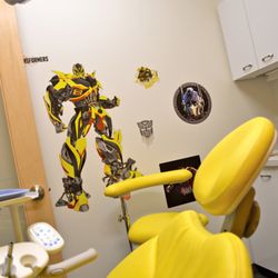 City Orthodontics and Pediatric Dentistry - Yellow Room - Each room in our Pediatric section is uniquely designed to instill courage and happiness in our young patients.