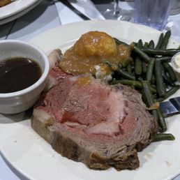 Prime rib, medium rare ($31.75).  Comes with soup or salad