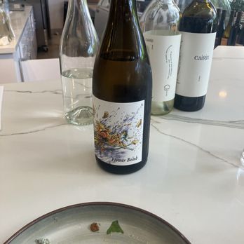 Gravesend Wine Merchant & Eatery - Flower bomb wine - Wine Bars Near Me - Paso Robles, California Gravesend Wine Merchant & Eatery - Flower bomb wine - Wine Bars Near Me - Paso Robles, California