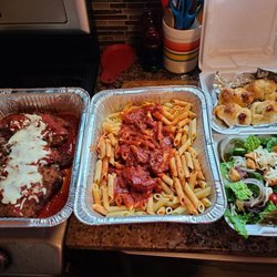 Madison Theater - 1 order of Chicken Parmigiana, with penne pasta (marinara), garlic knots and side salad. Service for 2 - I could feed 4 on this.
