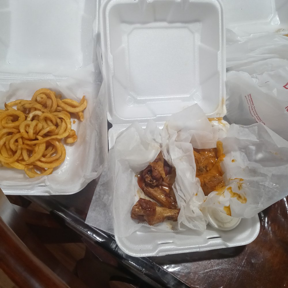 This one is four orders of one wing flavor and four of another with the soggy soft curly fries that had to be reheated in the air fryer This one is four orders of one wing flavor and four of another with the soggy soft curly fries that had to be reheated in the air fryer