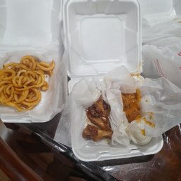 This one is four orders of one wing flavor and four of another with the soggy soft curly fries that had to be reheated in the air fryer