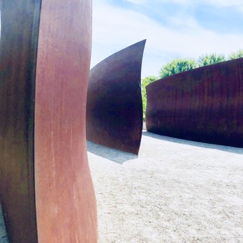 Olympic Sculpture Park - Wake is a 2004 weathering steel sculpture by Richard Serra, installed at Olympic Sculpture Park in Seattle. - Parks Near Me - Seattle, Washington Olympic Sculpture Park - Wake is a 2004 weathering steel sculpture by Richard Serra, installed at Olympic Sculpture Park in Seattle. - Parks Near Me - Seattle, Washington