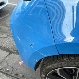 Before: Scratched rear bumper from parking lot fender bender Before: Scratched rear bumper from parking lot fender bender
