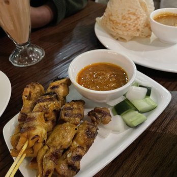 Nyonya - Satay chicken (5/5): juicy and tasty. Peanut sauce on side. - Malaysian Near Me - New York, New York Nyonya - Satay chicken (5/5): juicy and tasty. Peanut sauce on side. - Malaysian Near Me - New York, New York