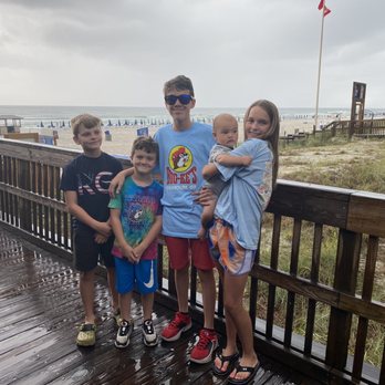Pineapple Willy's - Outside on the deck before you go in to eat. Great views. - Seafood Near Me - Panama City Beach, Florida