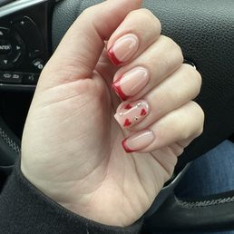 Structured Russian manicure with red French tip and crystals Structured Russian manicure with red French tip and crystals