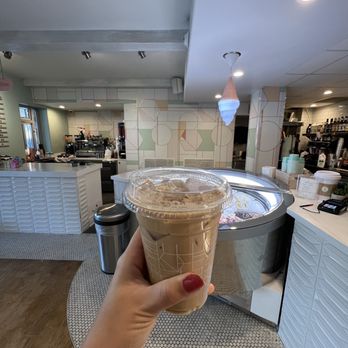 Cup & Cone - a hand holding a cup of coffee - Desserts Near Me - Phoenix, Arizona