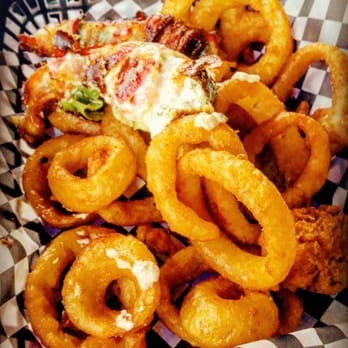 Mr M's Hot Wings And Things - Shrimp and cream cheese stuffed jalapeños wrapped in bacon on a bed of onion rings! - Chicken Wings Near Me - Montebello, California Mr M's Hot Wings And Things - Shrimp and cream cheese stuffed jalapeños wrapped in bacon on a bed of onion rings! - Chicken Wings Near Me - Montebello, California