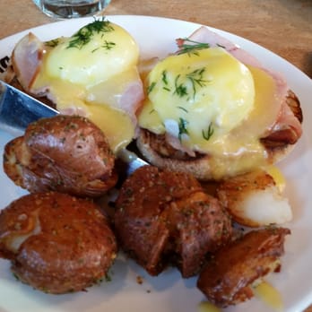 LOLA - Egg benedict on home made English muffin. - Greek Near Me - Seattle, Washington LOLA - Egg benedict on home made English muffin. - Greek Near Me - Seattle, Washington
