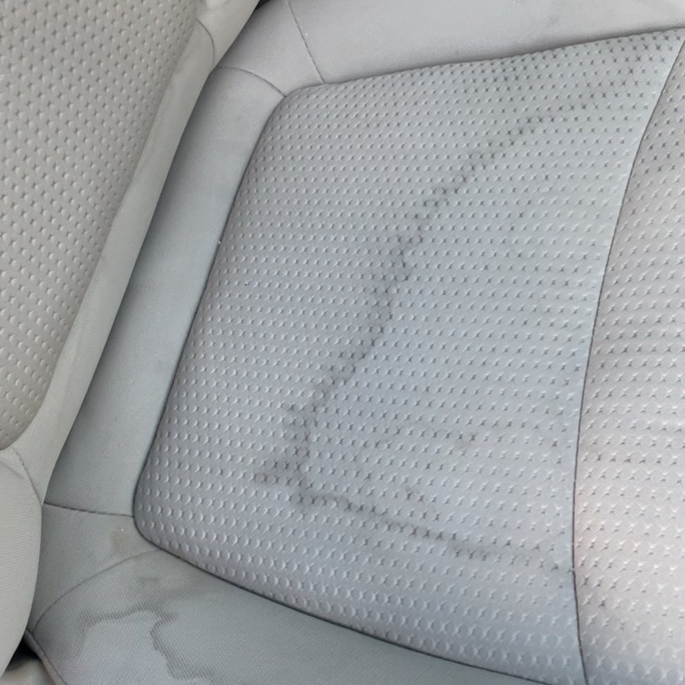 Cobblestone Auto Spa - Water stain on a cleaned seat.  Really?!?! - Auto Detailing Near Me - Gilbert, Arizona