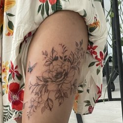 Nien Tattoo Studio - I wish the photo was clearer so that you can see the amazing line work that's been done