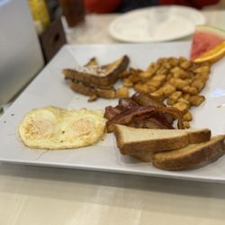 Distrito at Ocean Resort Casino - 2 eggs with bacon, French toast and potatoes