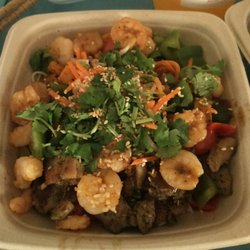 Lime chil shrimp and Lemongrass chicken with chilled noodles, sweet peppers, sweet potatoes, pickled radish, Tangy Tamarind sauce