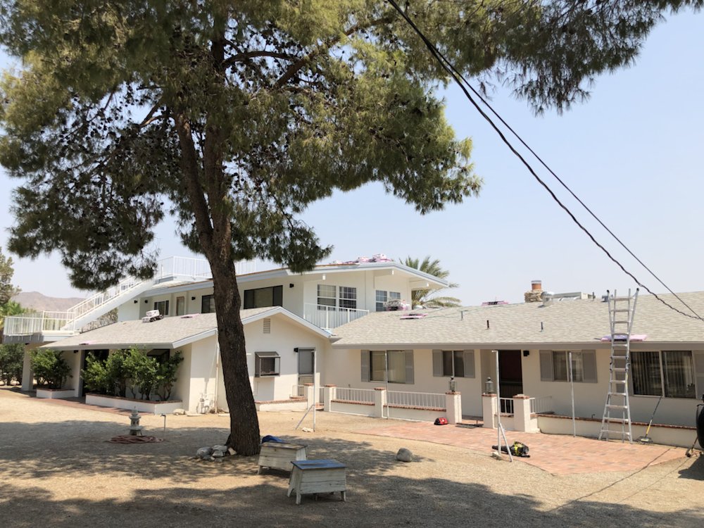 Slide of AMG Roofing