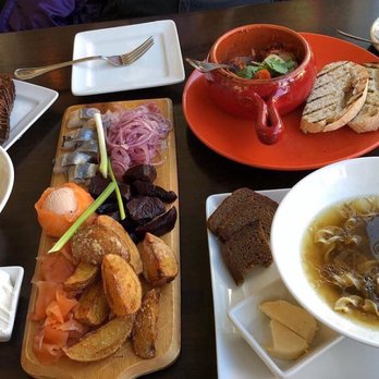 Tryzub Ukrainian Kitchen - The whole spread. Fish Trio, all house-made, Roasted Eggplant, Carpathian Mushroom Soup, Orange Varenyks - Ukrainian Near Me - Chicago, Illinois