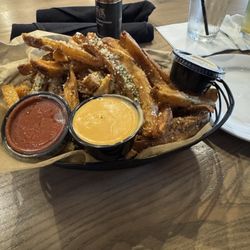 Truffle fries with in-house sauce and cheese... perfection