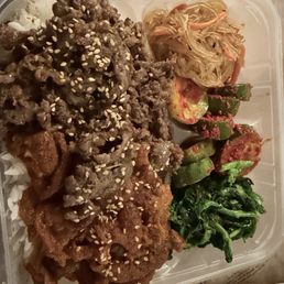 Combo Plate: half Beef Bulgogi and Spicy pork with japchae, Korean broccoli, spicy cucumbers Combo Plate: half Beef Bulgogi and Spicy pork with japchae, Korean broccoli, spicy cucumbers