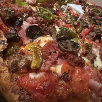 River Rick's Pizzeria - Meat lovers pizza, and I added green peppers and jalapeños - Pizza Near Me - Laughlin, Nevada