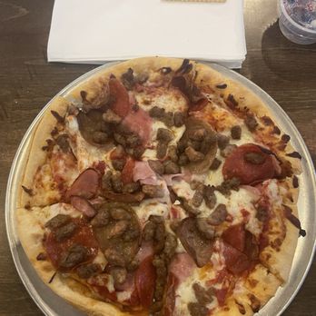 Back Road Pizza & Grill - 9inch pizza. With "Sale Barn" toppings. Delicious. Crust was light and crisp. But not St.Louis style. Thicker - Pizza Near Me - Hawk Point, Missouri