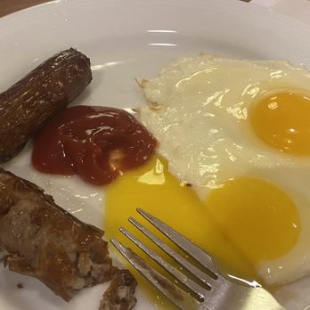 Acorn Café - Side of sausage and eggs for my banana foster pancake. - Cafes Near Me - Oroville, California