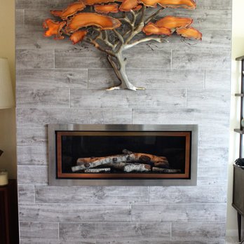 Midwest Remodeling - a fireplace in a living room - General Contractors Near Me - Pendleton, Indiana Midwest Remodeling - a fireplace in a living room - General Contractors Near Me - Pendleton, Indiana