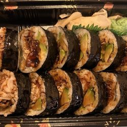 Shumai Wok - Spider Roll - big portion $13. Held together well. Made with soft shell crab, avocado, cucumber with eel sauce.