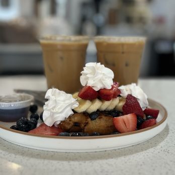 Boulevard West - Iced Latte with unsweetened almond milk and Berry Waffles - Bagels Near Me - Clayton, North Carolina Boulevard West - Iced Latte with unsweetened almond milk and Berry Waffles - Bagels Near Me - Clayton, North Carolina