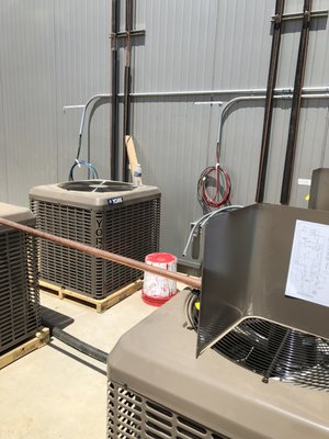 Electrical re wire - This is a TI (Tenant improvement) building and the job was to initially install a two brand new AC System.  My team and demo the old existing unit and installed rigid piping as a raceway and pulled brand new wires for two AC system units.