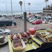 Photo of South Beach Bar & Grille - San Diego, CA, United States. Bar style seating along the perimeter of the upstairs, perfect for people watching and a fresh ocean breeze!