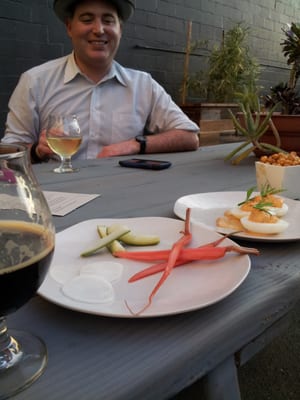 Photo of Lost & Found Beer Garden - Oakland, CA, US. Picked of the day, fried chickpeas and deviled eggs