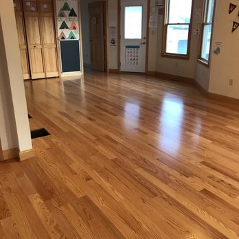 Abner Wood Floors - an empty living room - Flooring Near Me Abner Wood Floors - an empty living room - Flooring Near Me