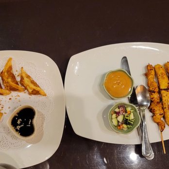 BKK Thai Kitchen - Appetizers: Chicken Satay and dumplings - Thai Near Me - Carlsbad, California BKK Thai Kitchen - Appetizers: Chicken Satay and dumplings - Thai Near Me - Carlsbad, California