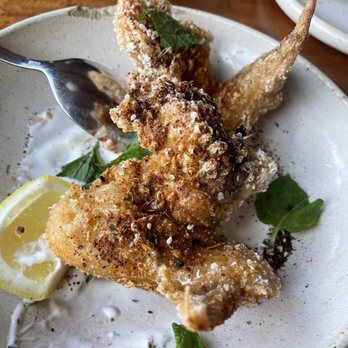 Squable - The spicy hen is a MUST I still drool thinking about this - Modern European Near Me - Houston, Texas