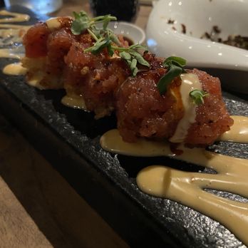 Kitchen Master - Spicy Tuna Fried Rice Roll (half eaten) - Sushi Bars Near Me - Suwanee, Georgia