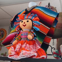 Paqueteria Neza - Dolls on the shelf