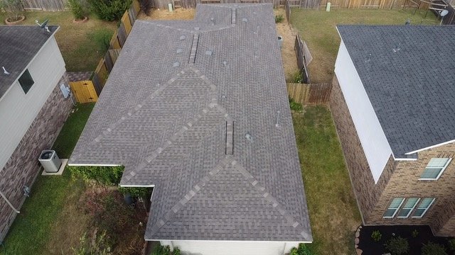 Slide of Rhodes Roofing Services