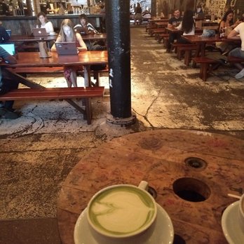 Sawada Coffee - Matcha latte on the background of their adjacent restaurant - Coffee & Tea Near Me - Chicago, Illinois Sawada Coffee - Matcha latte on the background of their adjacent restaurant - Coffee & Tea Near Me - Chicago, Illinois