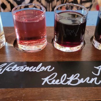 Windmill Farm Winery - four glasses of different wines - Wineries Near Me - Seguin, Texas