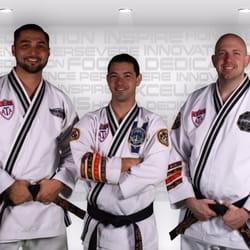 Legacy Martial Arts Family Fitness Center - Mr. Gregory, Mr. Erdman, Mr. Golden taking time to snap the picture at the "venom of Vegas"