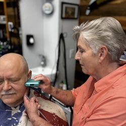Ladd's Barber Shop - Barbara adding some nice final touches to a haircut!