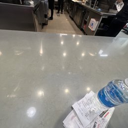 Burger on the floor next to the cook. Burger on the floor next to the cook.