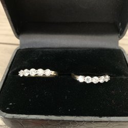 Krutolow Jewelers - Diamond anniversary bands in yellow gold with white gold setting